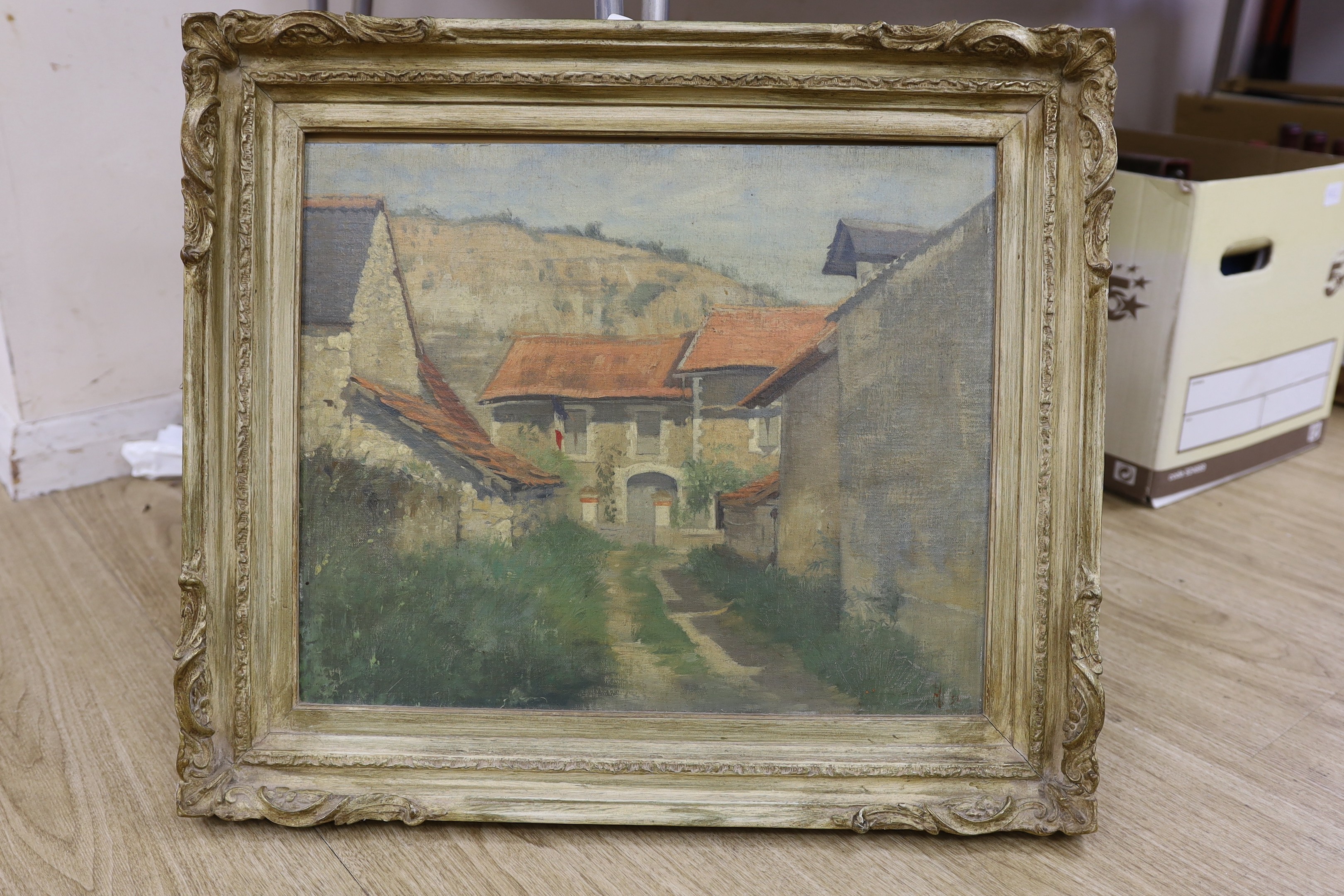 French School, oil on canvas board, Village street scene, indistinctly signed, 37 x 45cm